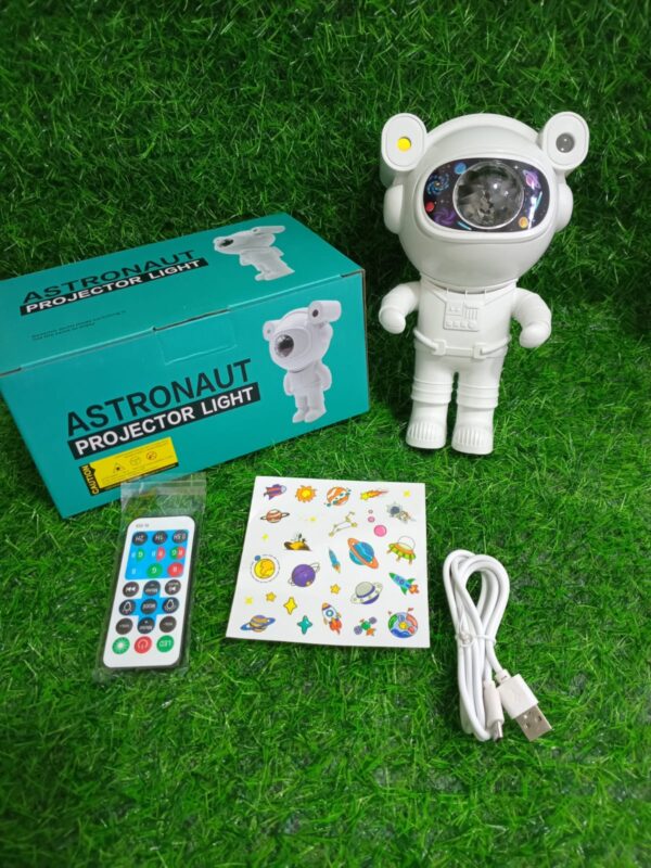 PROYECTOR ASTRONAUTA GALAXIA CON PARLANTE Y STICKERS